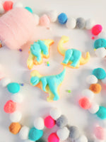 Savon dinosaure bleu et vert